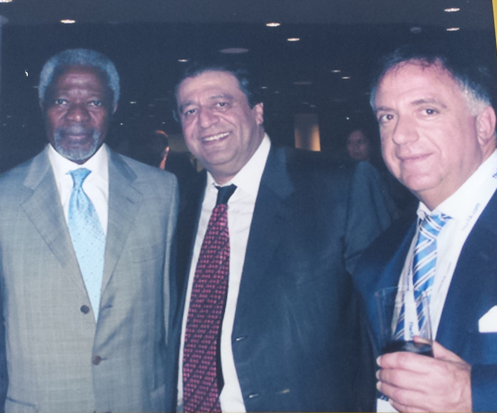 Kofi Annan, Secretary General of United Nations; Ramon DeSage; Robert Earl, CEO of Planet Hollywood International.