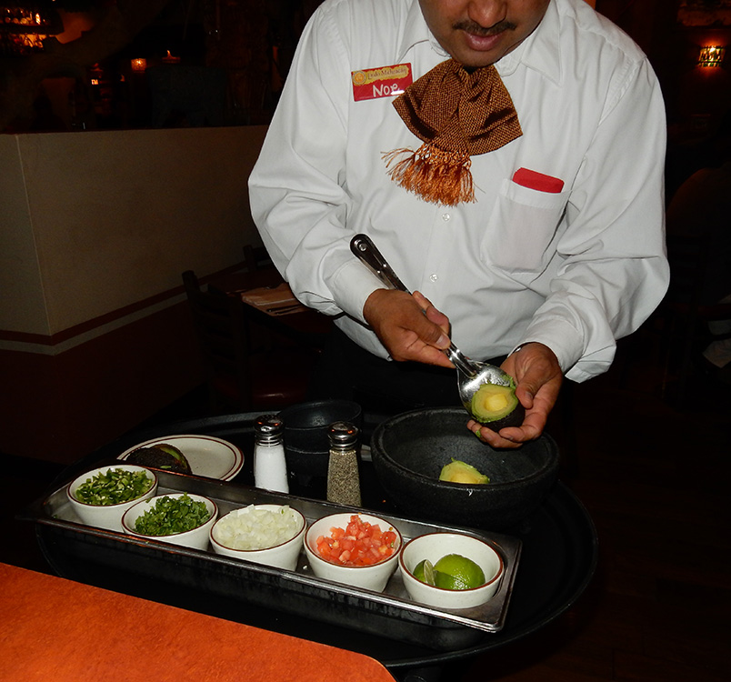 Lindo Michoacan waiter Noe Cano prepares fresh guacamole at our table, West Flamingo Las Vegas